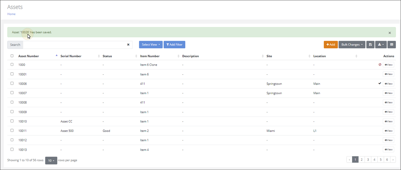 Assets page showing the confirmation message that the new auto-numbered asset has been saved, above the asset list
