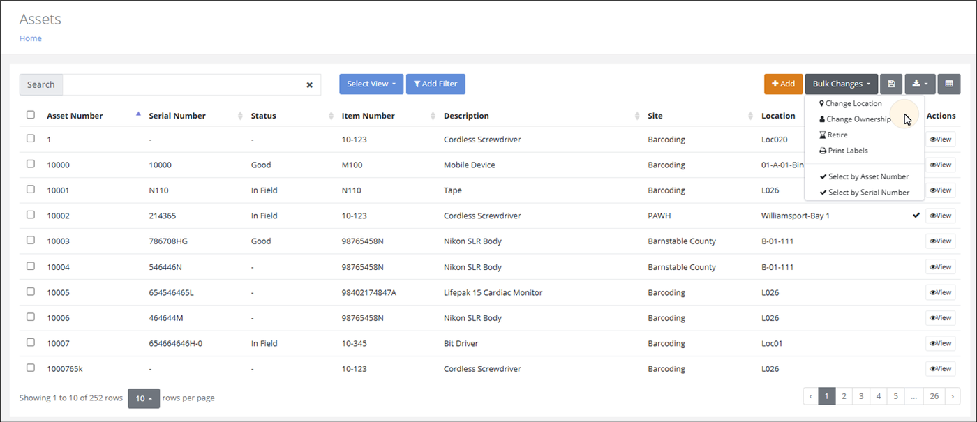 Assets page with the Bulk Changes menu open showing Change Location, Change Ownership, Retire, Print Labels, Select by Asset Number and Select by Serial Number