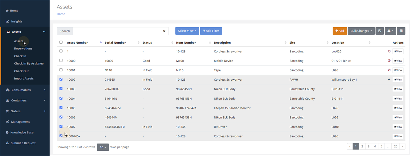 Assets page with seven asset rows selected by checkbox for label printing
